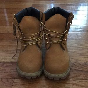 Pair of wheat timberlands size 7
